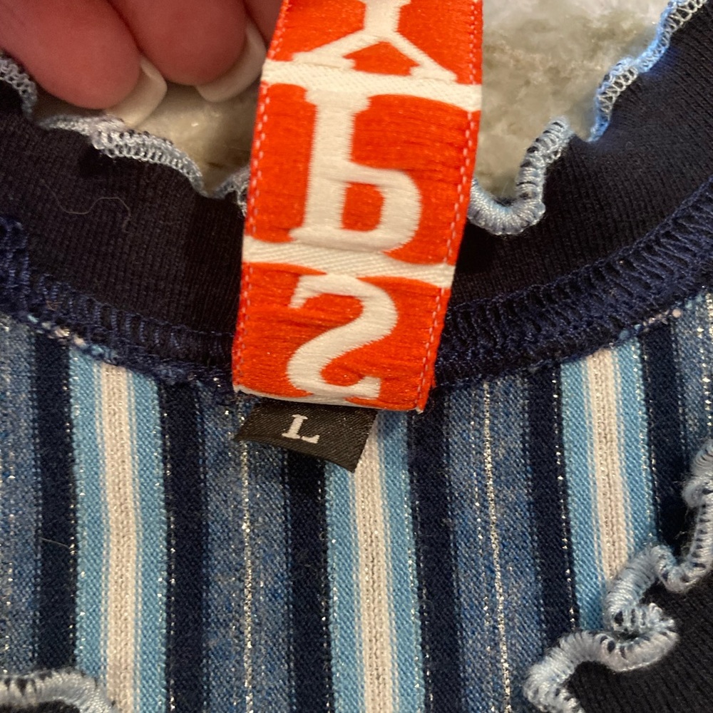 Navy tank with ruffle trim, white stripes